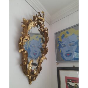 Nagy méretű, aranyozott rokokó stílusú falitükör díszes, faragott kerettel